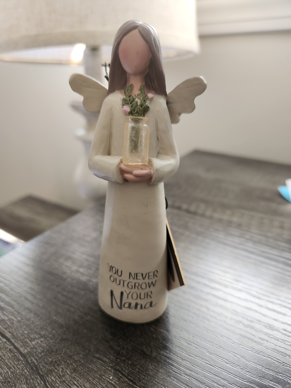 White Ceramic 'You Never Outgrow Your Nana' Angel Figurine